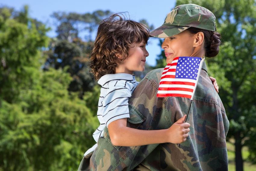 Soldier reunited with her son on a sunny day